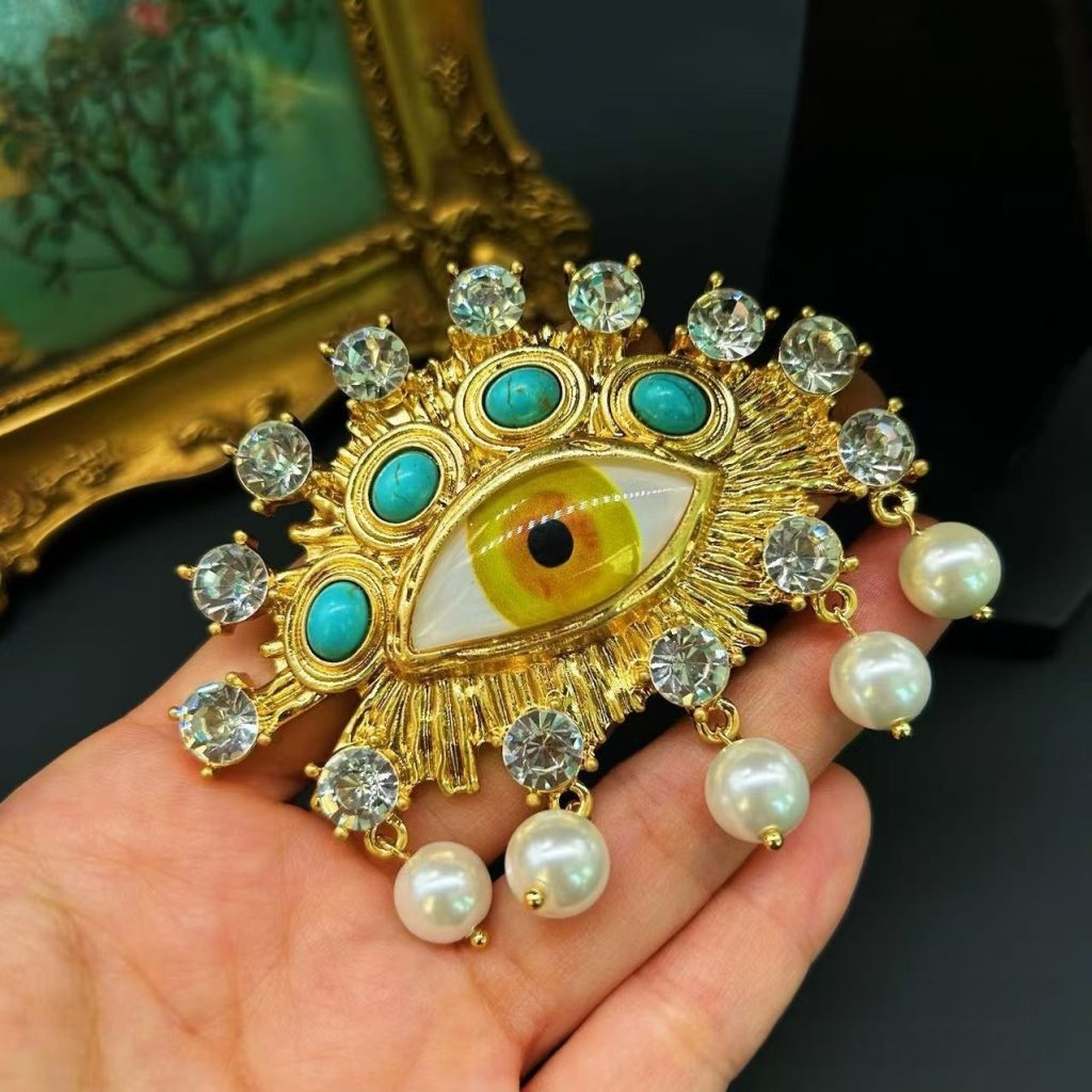 Antique Gold Turquoise Rhinestone Eye Brooch