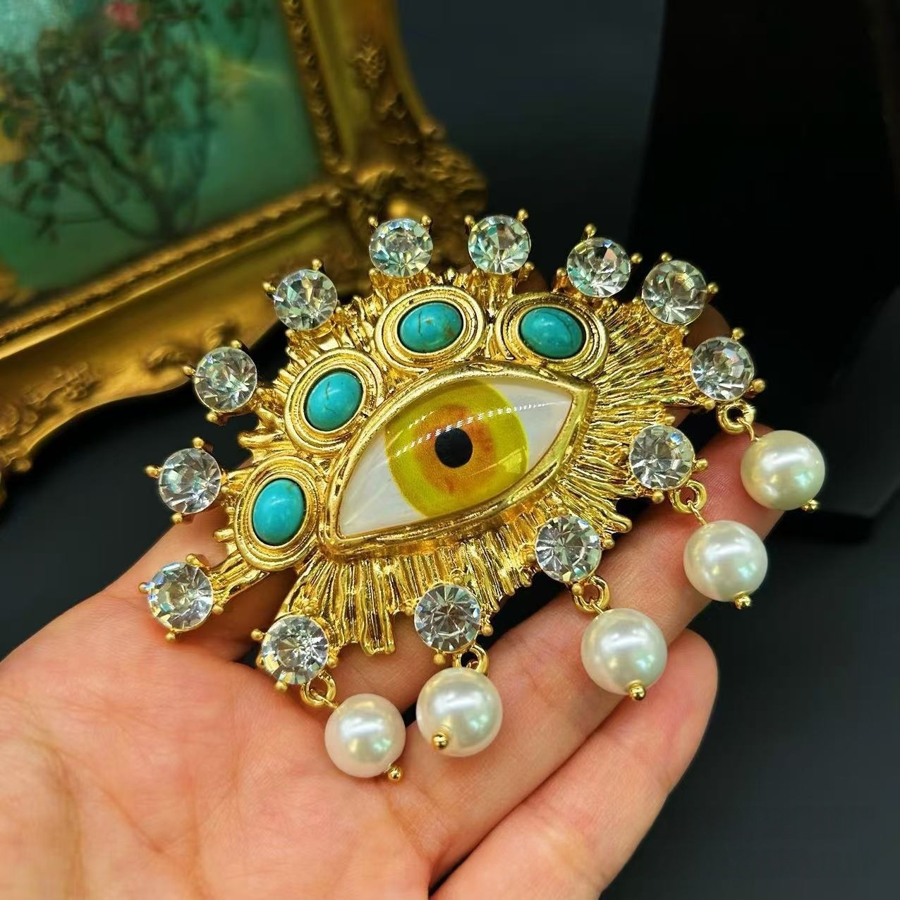 Antique Gold Turquoise Rhinestone Eye Brooch
