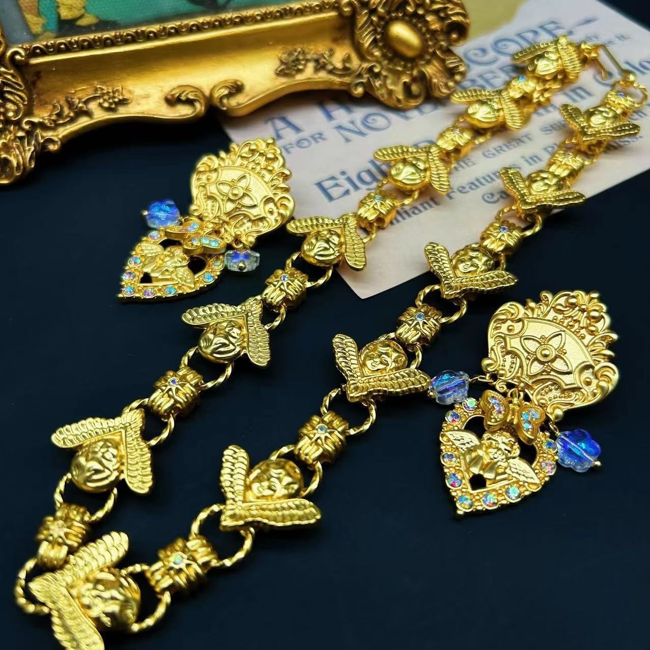 Antique Gold Winged Cupid Statement Earrings