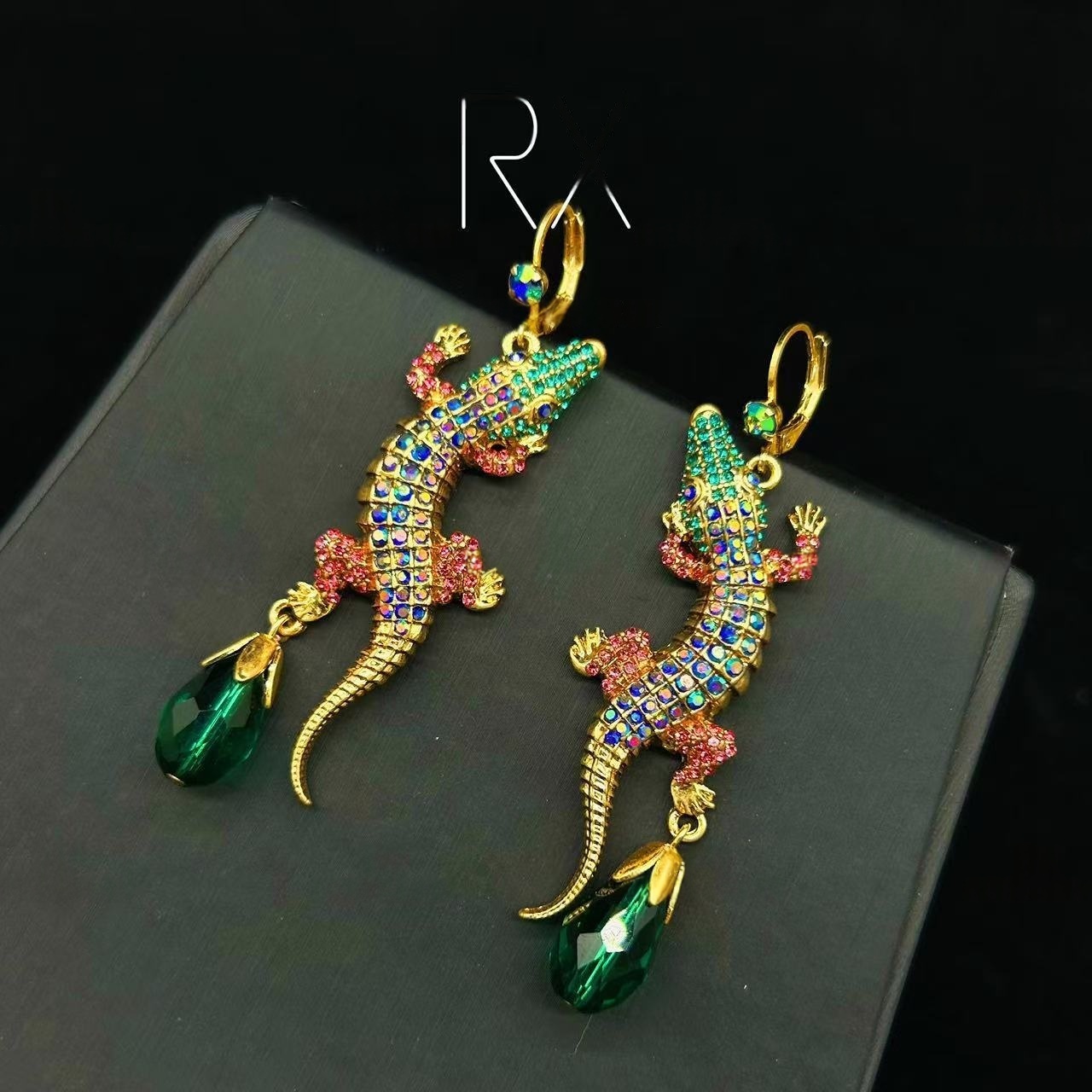 gold earrings with rhinestones