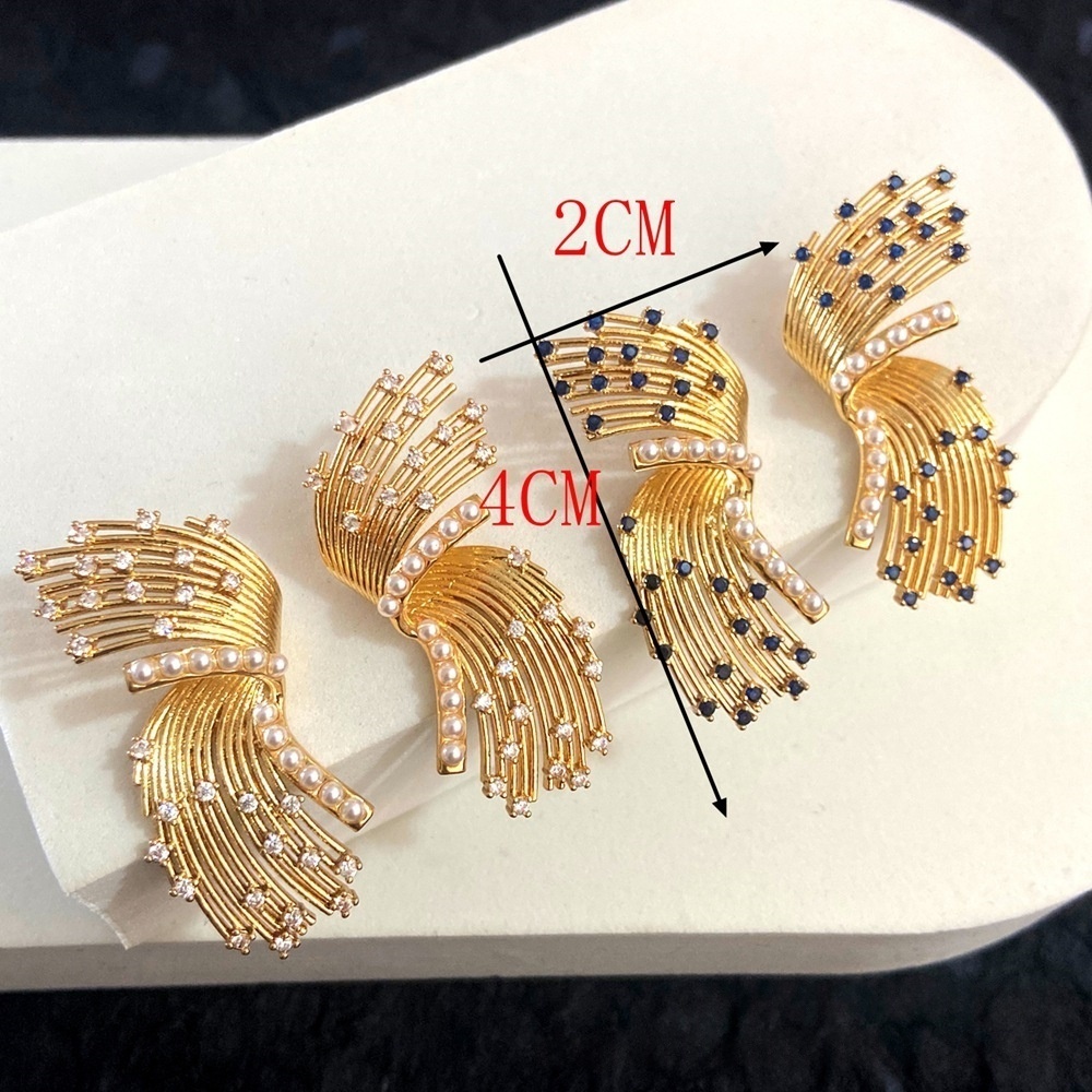 gold earrings with rhinestones