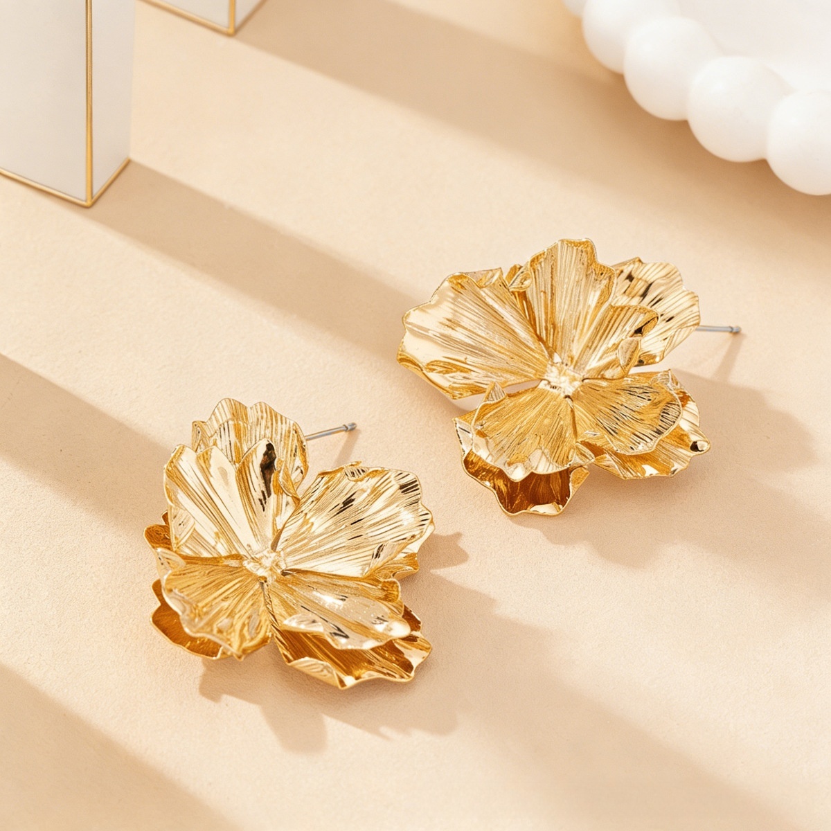 big sculptural gold flower fashion earrings