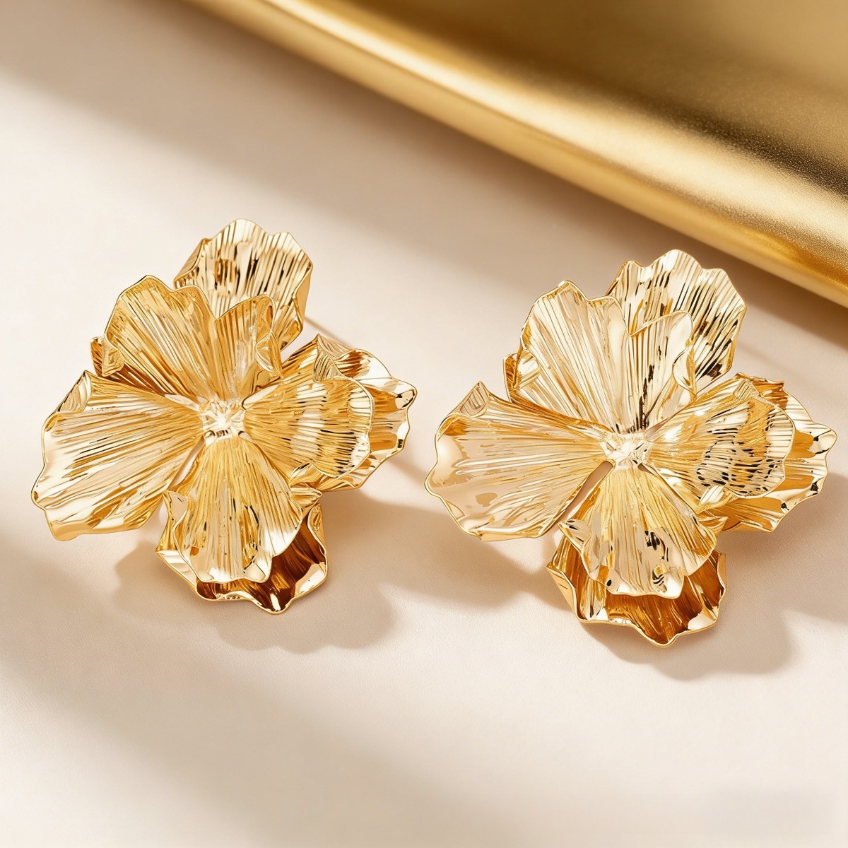 bold layered gold petal drop earrings