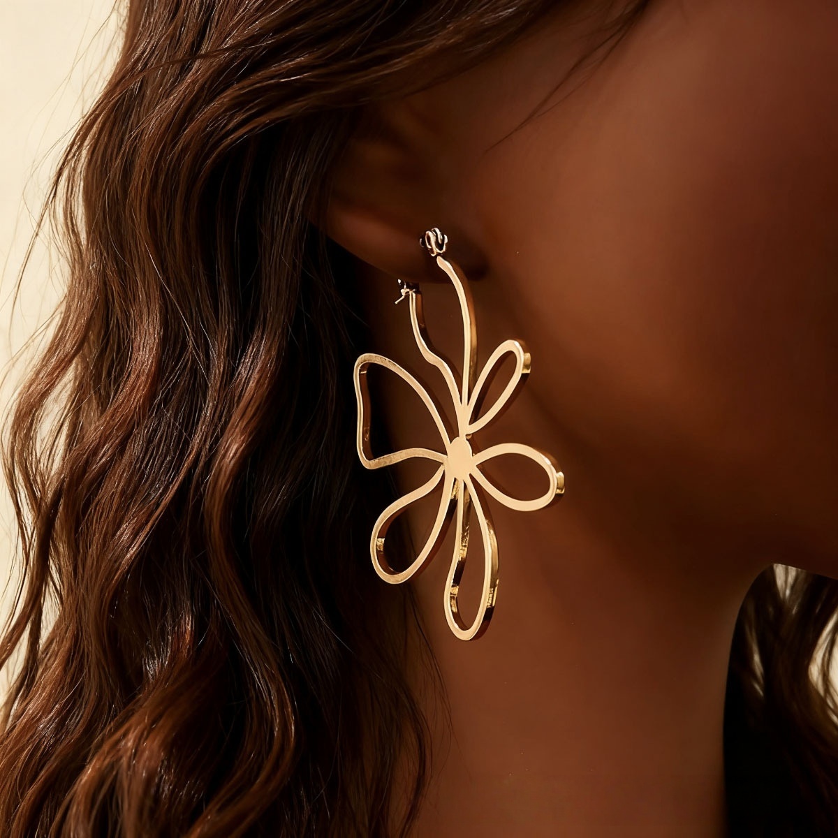 large hollow flower gold drop earrings