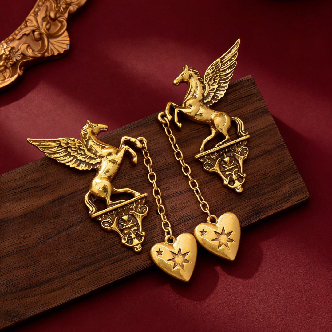 vintage gold winged horse drop earrings